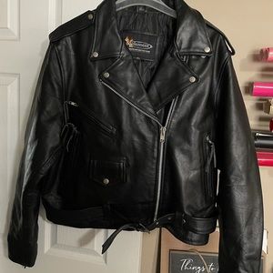 Ladies leather biker jacket. Tag is 4XL, runs small.